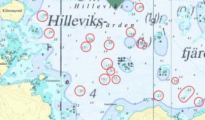 Kusten är stenig. Inringade grund visar korrigerar som Hydrographica fört in i sjökorten.